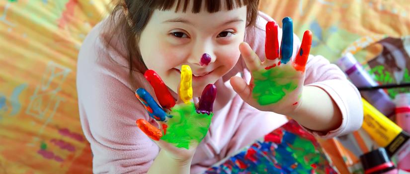 Child with painted hands